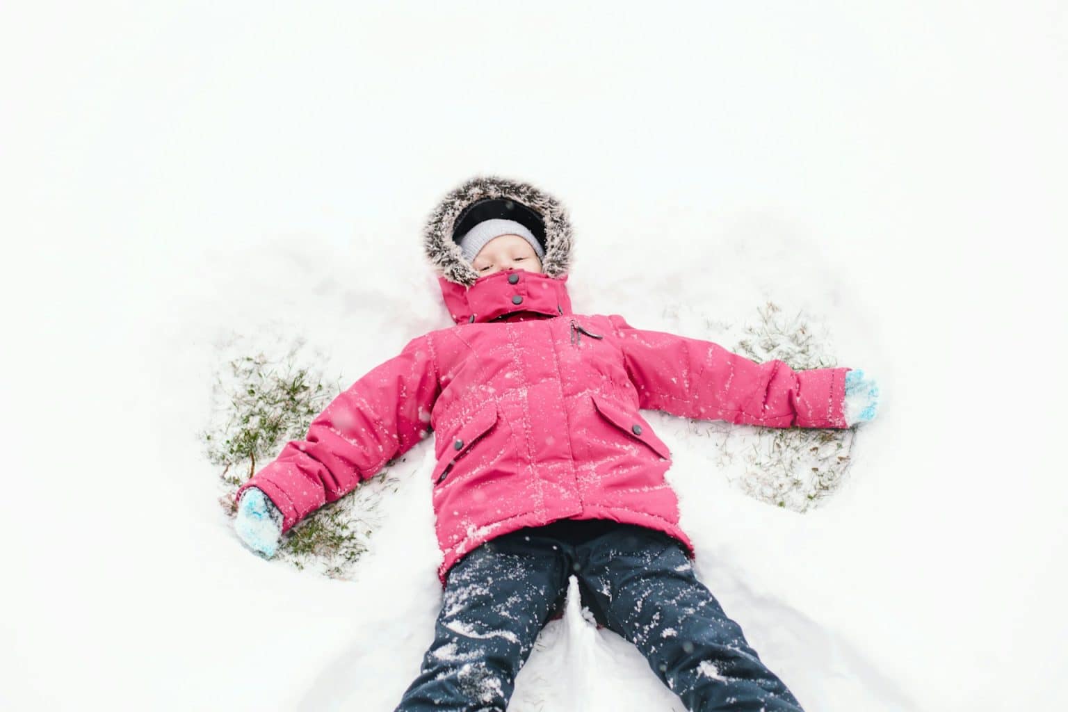 child in the snow. snowshoeing in Alps. 